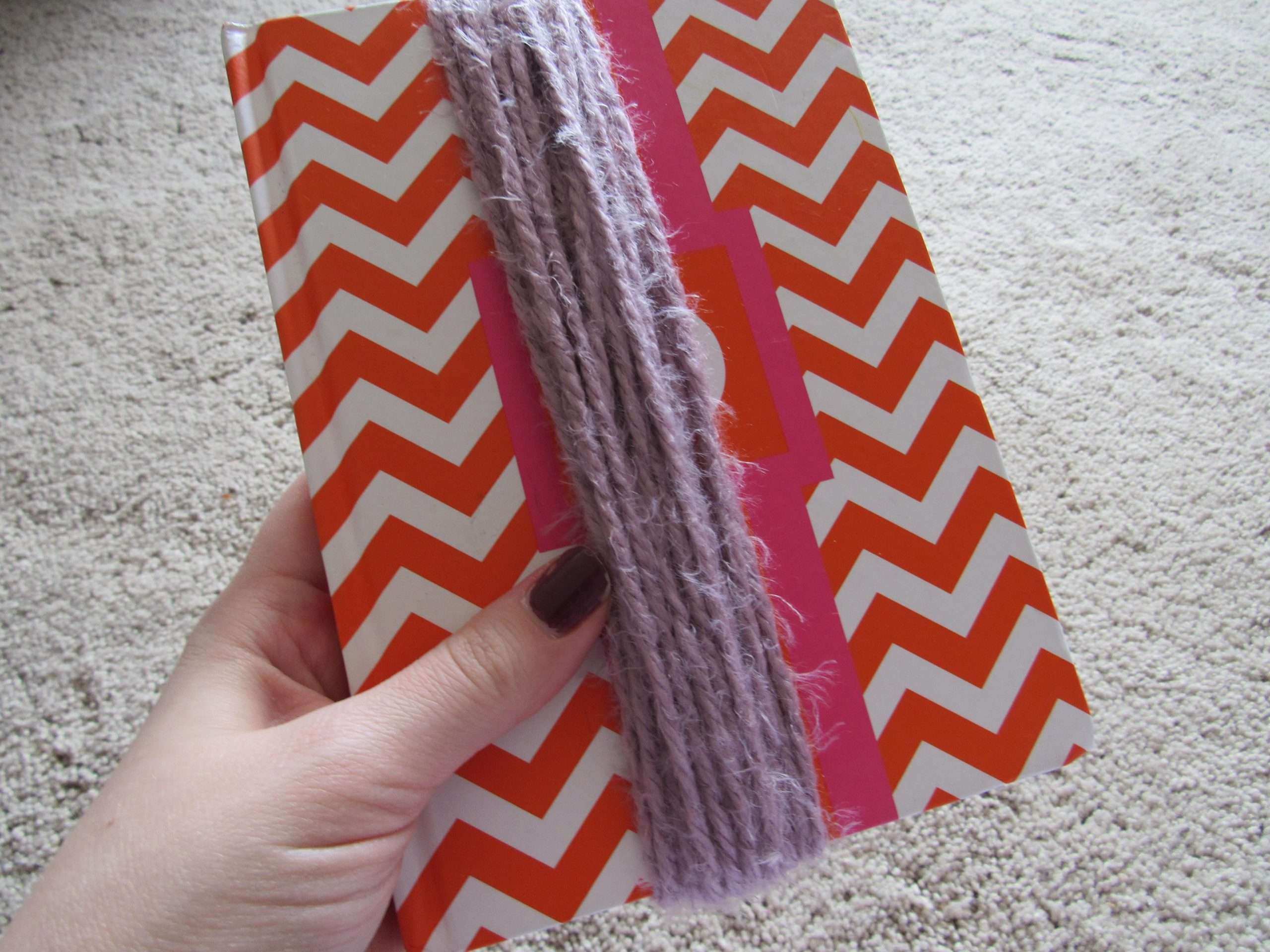 Wrap Yarn Around a Book to Make Tassels