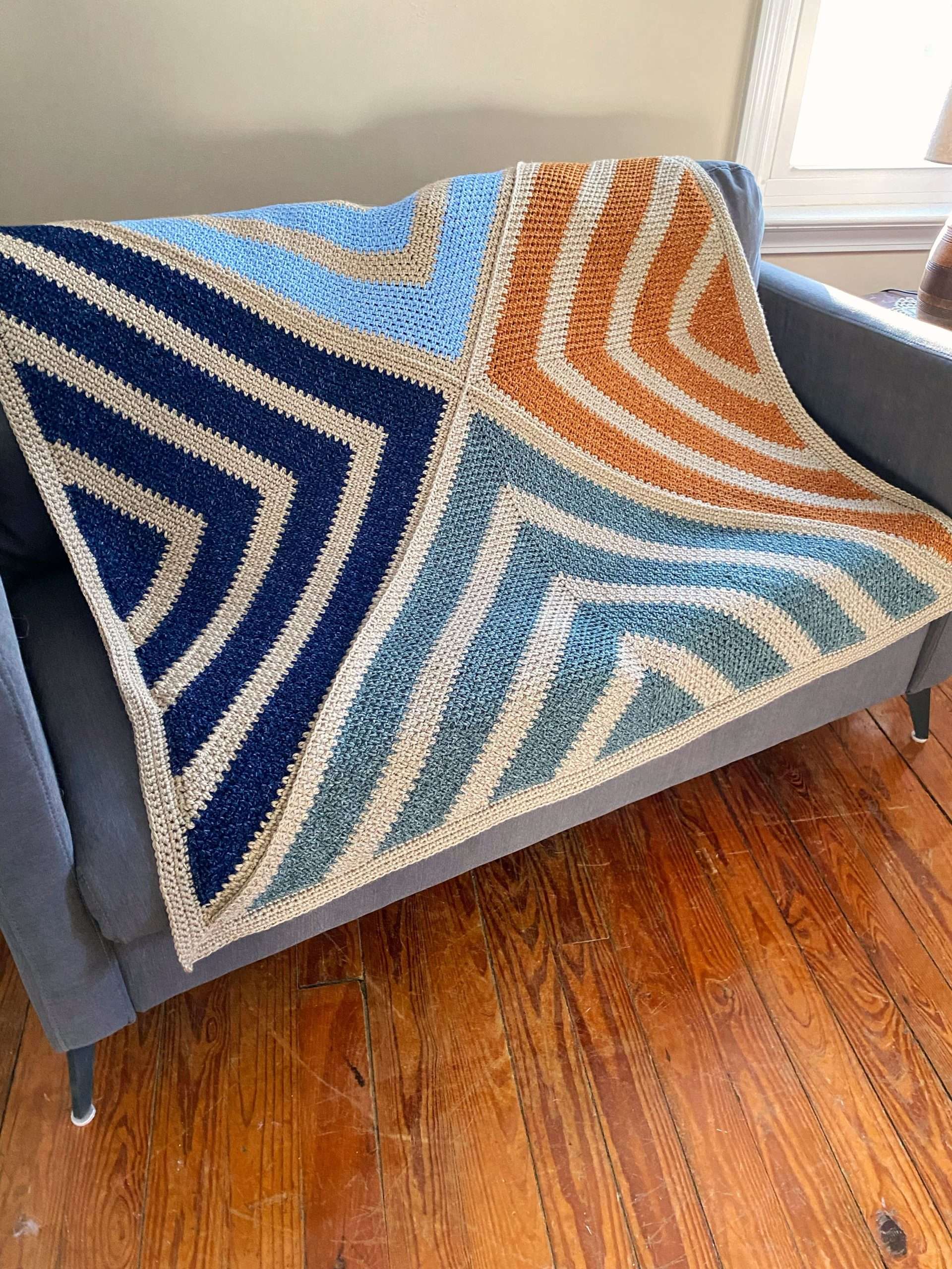 Modern Crochet Triangle Blanket using the Moss Stitch