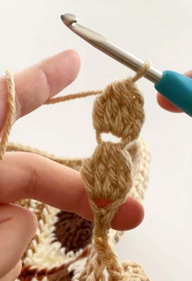 Learn to Crochet a Beautiful Pom Pom Border