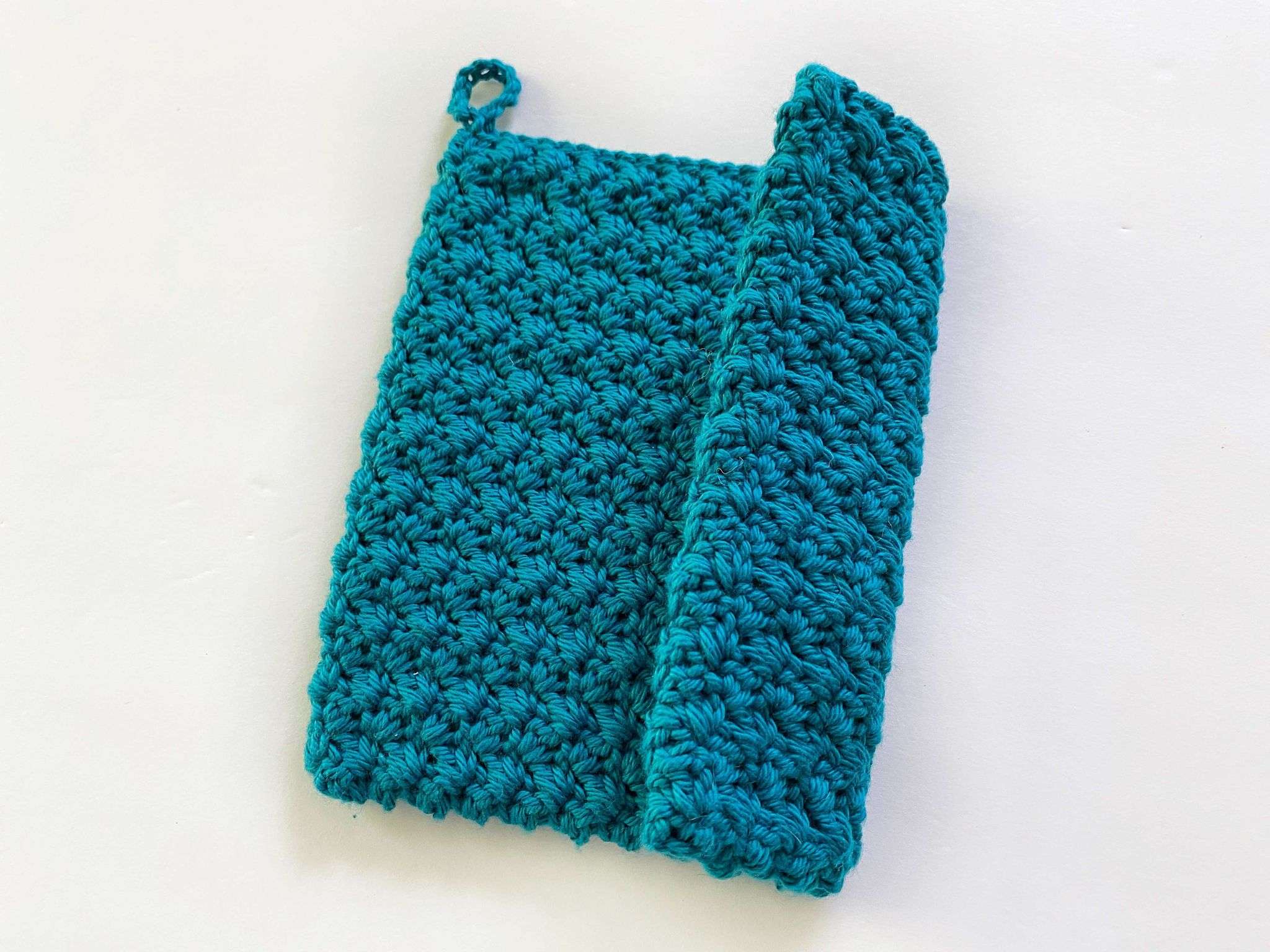 Side Seam of Double Thick Textured Crochet Potholder using the Blanket Stitch