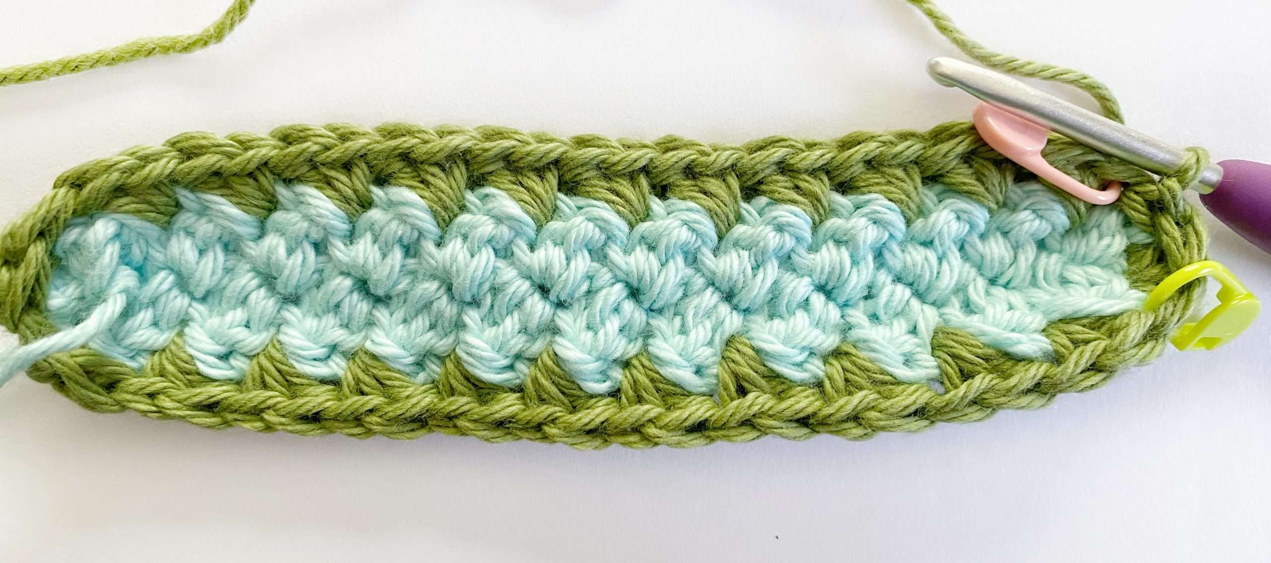 Round 2 of the Suzette Stitch Crochet Potholder