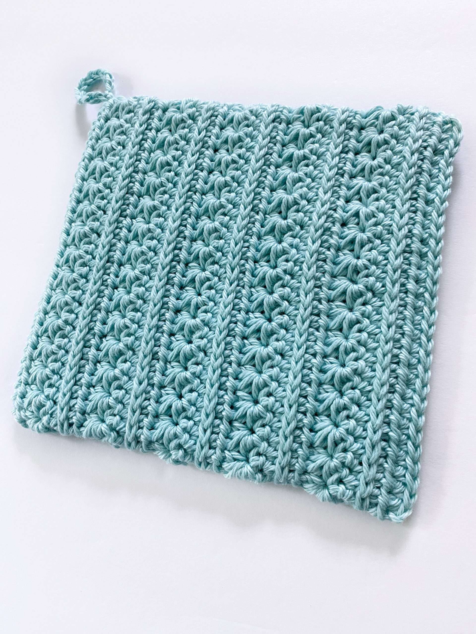 Front Side of the Written in Stars Star Stitch Crochet Potholder
