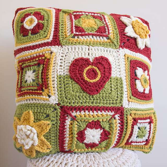 Different Granny Squares are joined to make this pillow cover